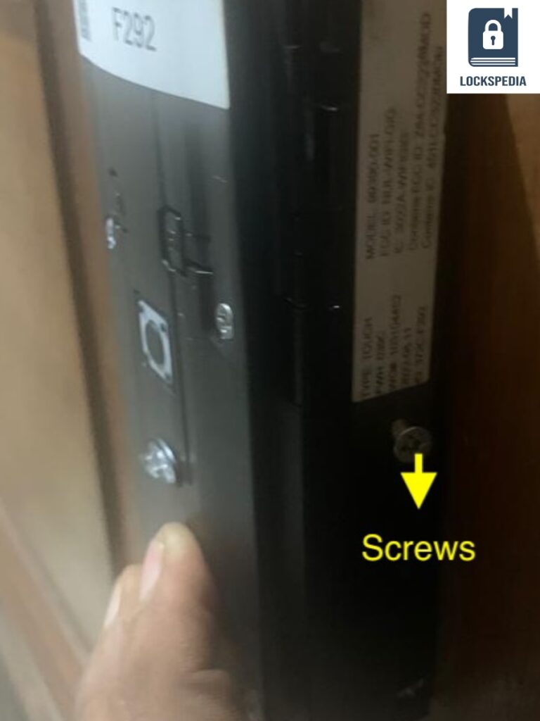 Remove the Battery Cover by removing the side screws
