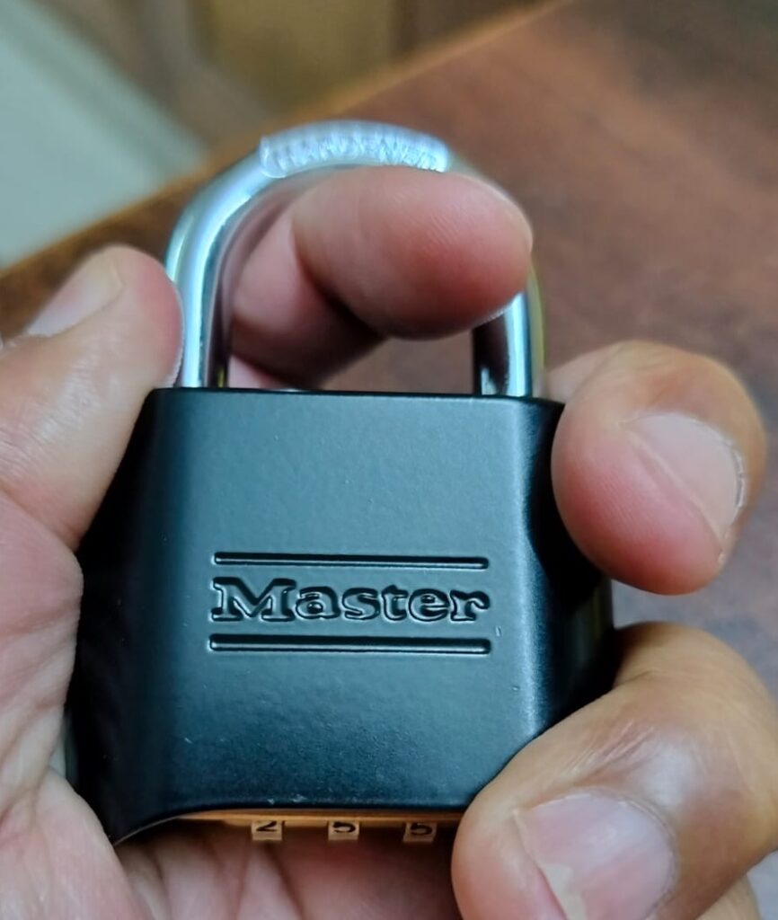 Creating tension on master lock 4 digit combination lock